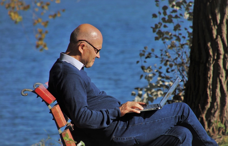 Senior man using a laptop
