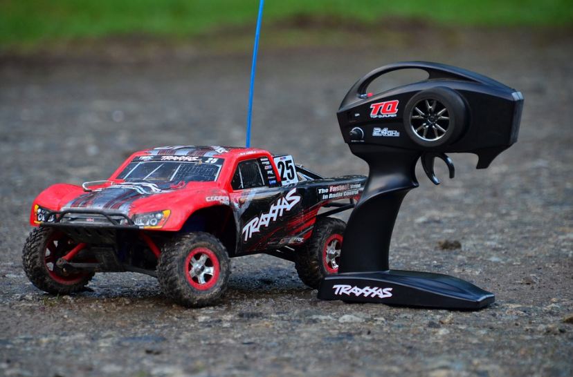 RC car and the remote control on a road